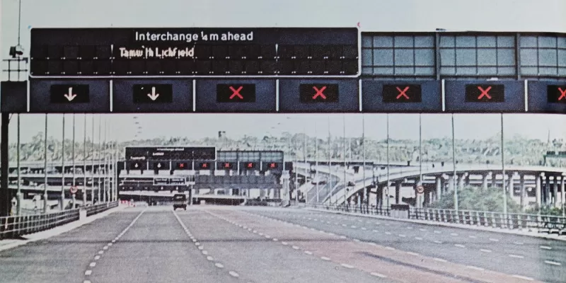 Experimental fibre optic signs on the Aston Expressway, with the legend "Tamw'th Lichfield". Click to enlarge