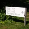 This sign shows off the pre-New Town house numbers on this section of road.